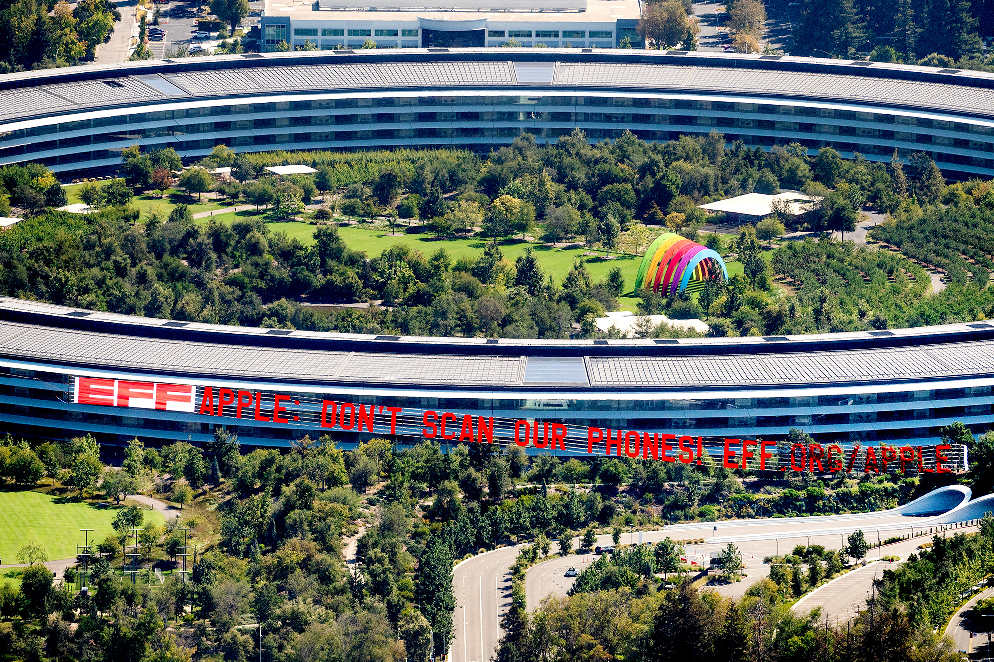 EFF banner flies over Apple Park, the corporate headquarters of Apple, located in Cupertino, California EFF banner flies over Apple Park, the corporate headquarters of Apple, located in Cupertino, California